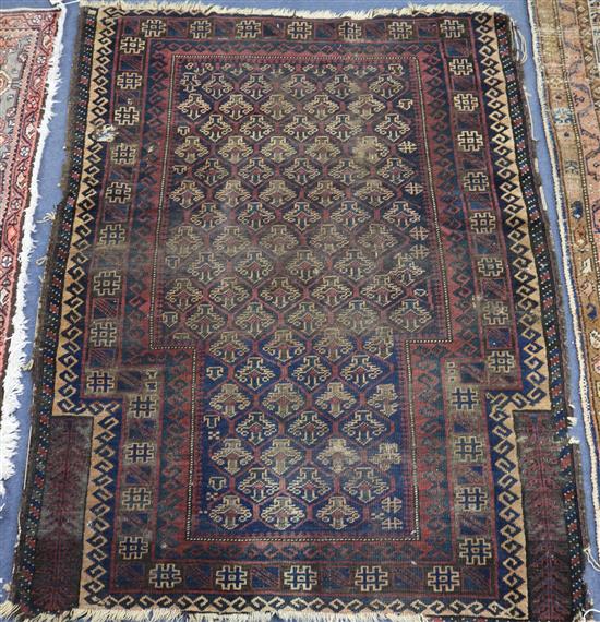 A Caucasian red ground prayer rug, 4ft 3in. x 3ft 4in.